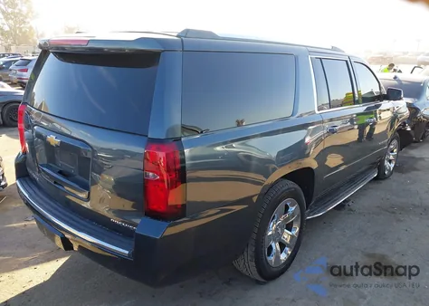 2019 Chevrolet Suburban Premier z USA, uszkodzony, nr VIN 1GNSCJKC5KR199873